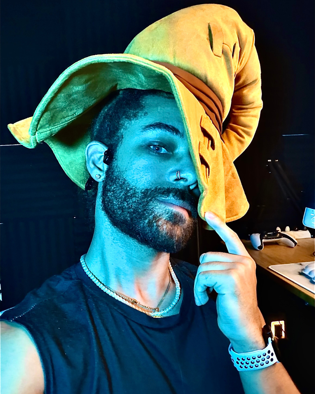 Stoney wearing a yellow Black Mage hat